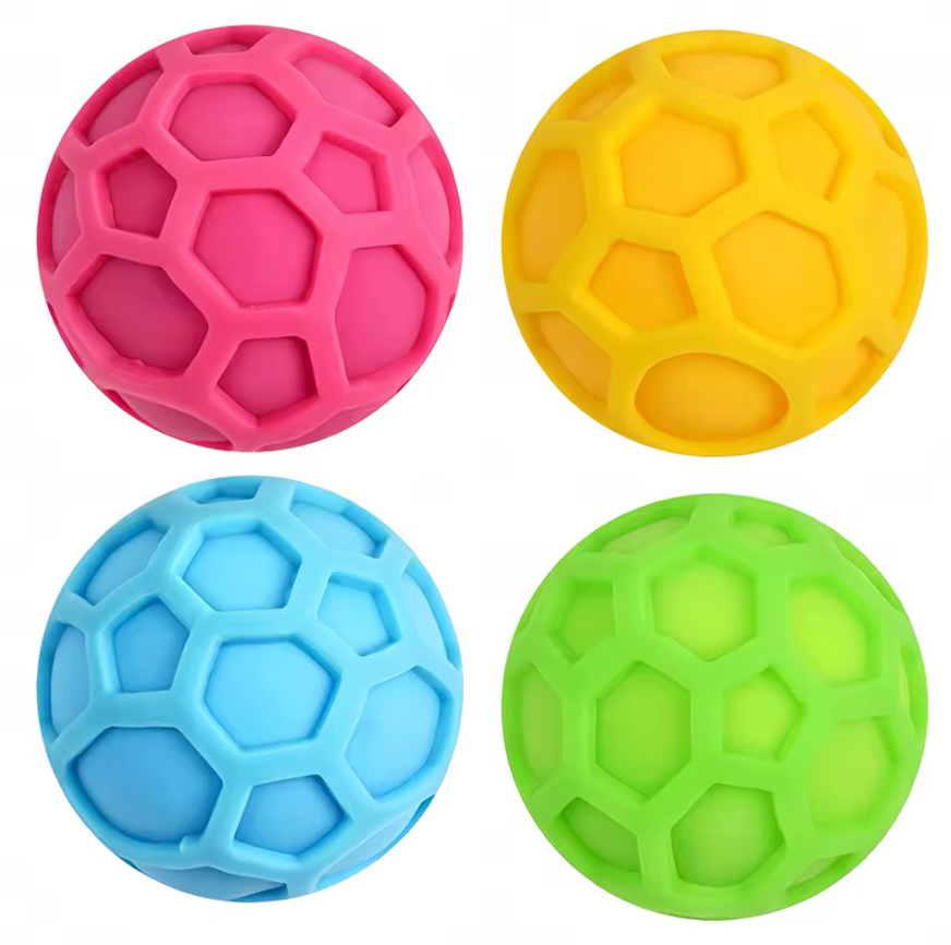 NeeDoh Atomic fidget squeeze toy in all three two-tone color variants — blue yellow, yellow pink, and pink blue