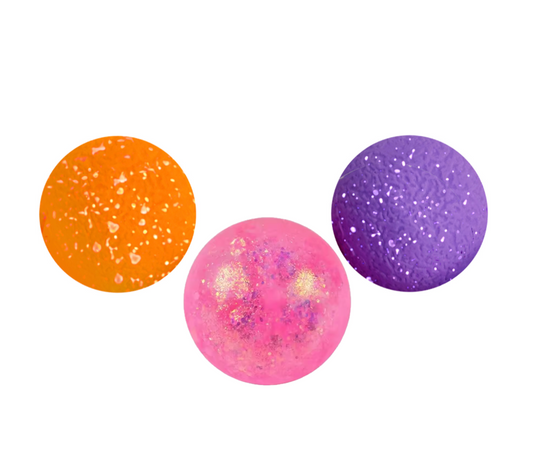 NeeDoh Dohnut Holes mini squishy donut hole fidget toys in sprinkle powdered sugar and cakey designs on white background